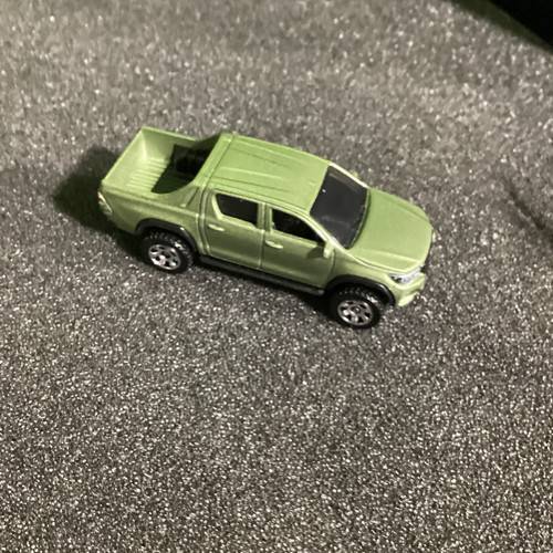 2018 Toyota Hilux / Green / Matchbox / 2022 - Picture 1 of 4