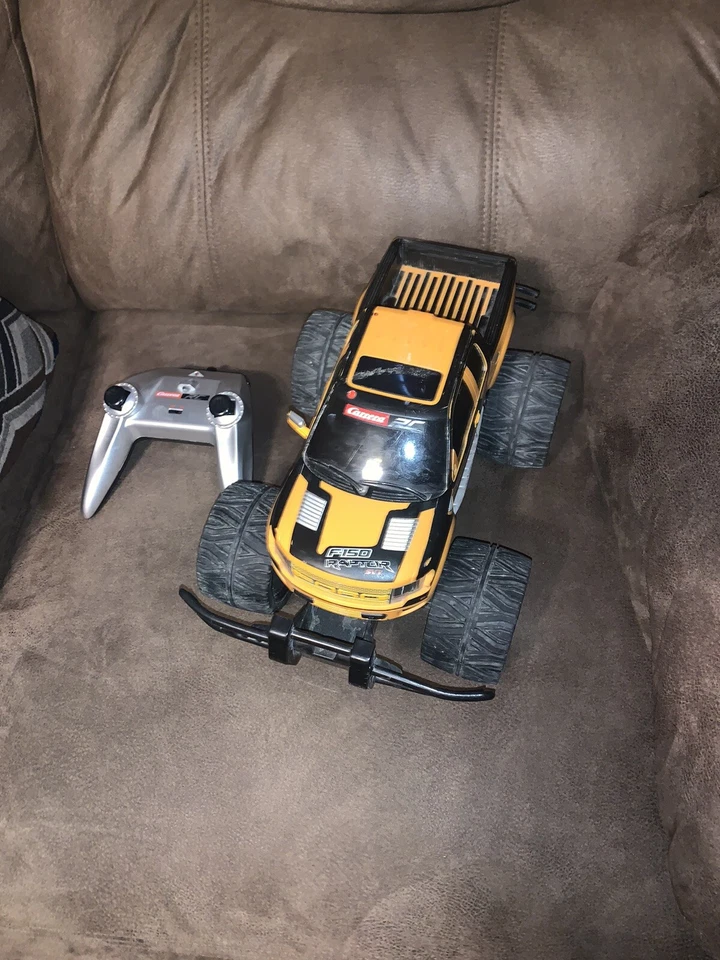 Camión todoterreno Carrera RC Ford F-150 Raptor amarillo 1:18 RC - sin cargador Foto 2 de 4