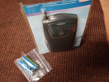 New GE Model 7-2585 Portable AM/FM Pocket Radio Receiver. New in open plastic