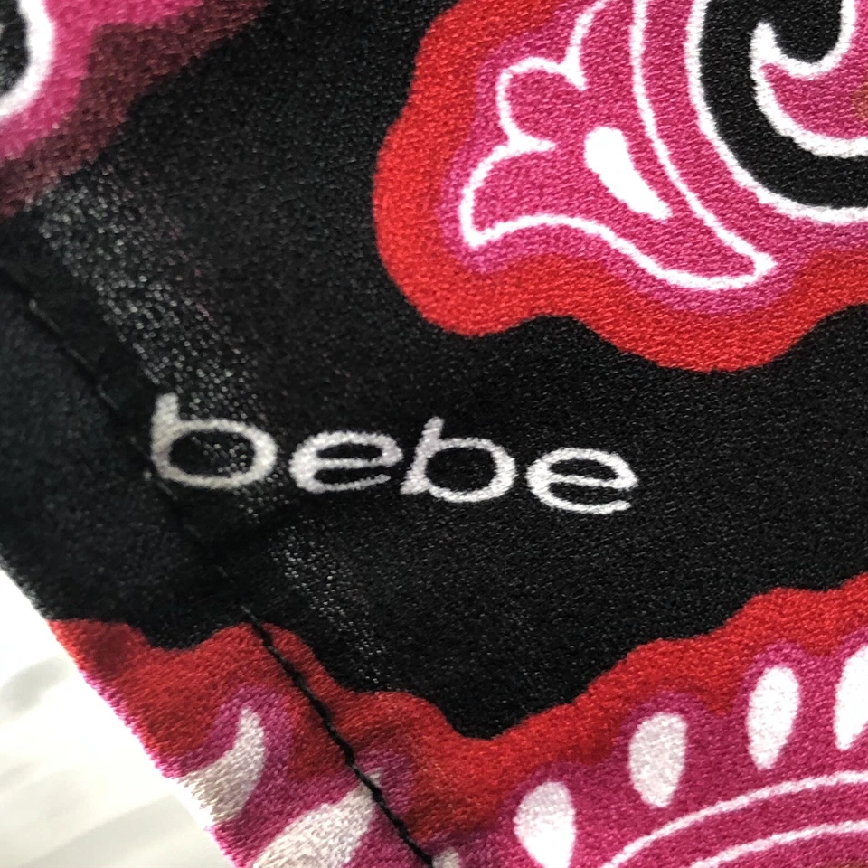 Bebe XS Mameluco Botones Jersey Negro Paisley Rosa Flores Foto 4 de 4