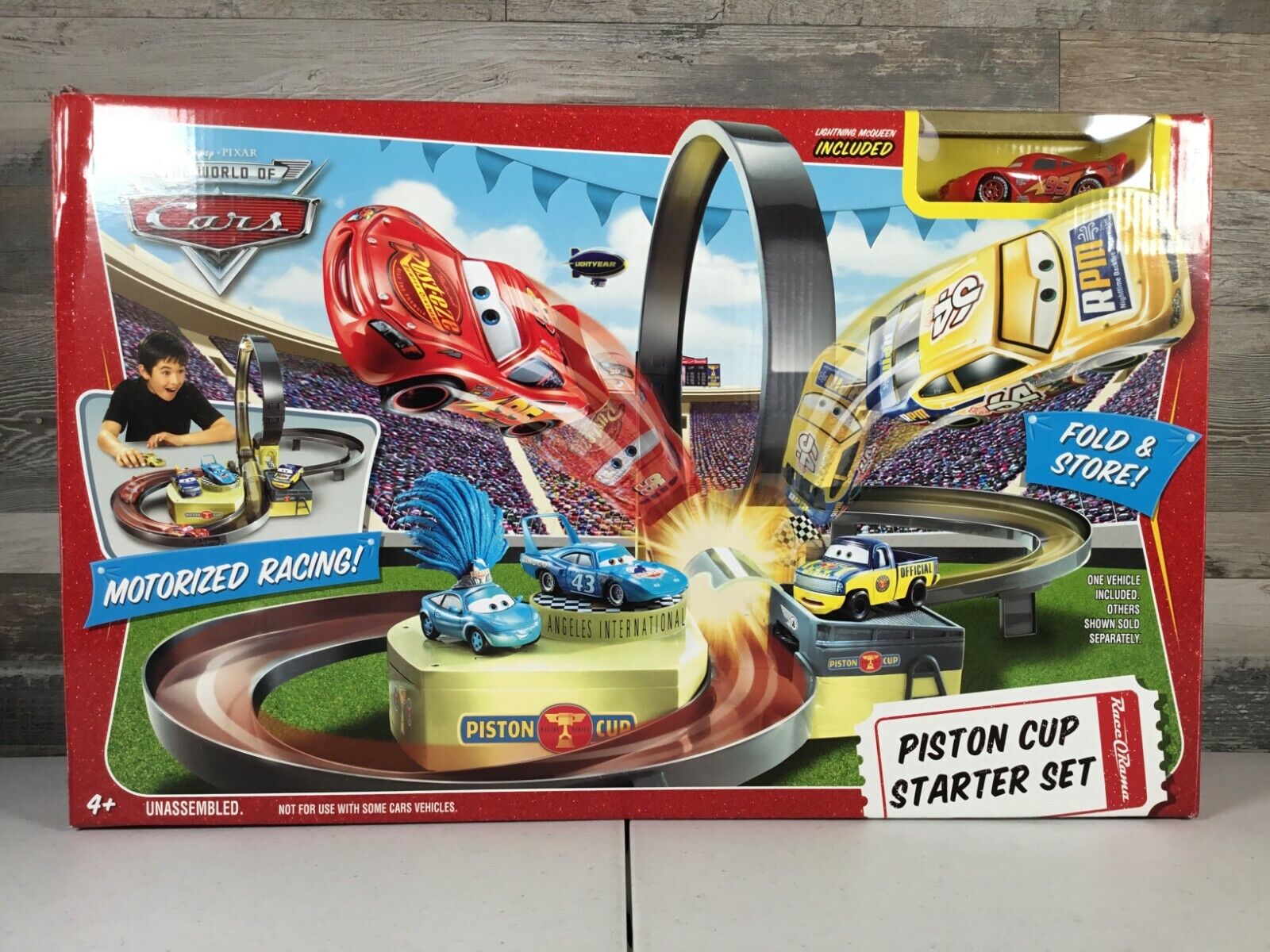 Disney Pixar Cars Piston Cup Starter Set Motorized Racing Fold & Store CARS102