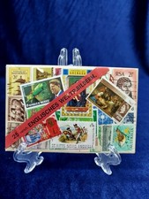 Une collection de timbres-poste du monde entier 13 cm