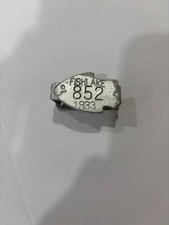 Vintage metal livestock ear tags