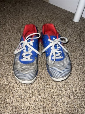 the Reebok CrossFit Nano 7.0 Weave sneakers, specifically a blue, white, and red