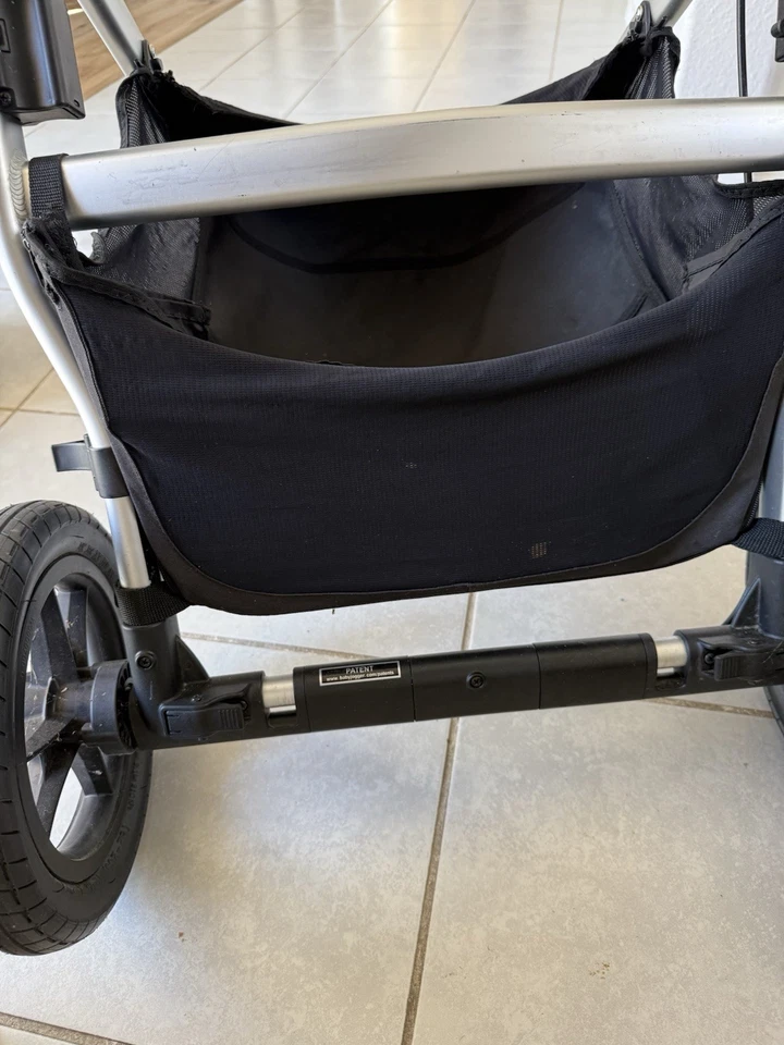 Cesta de almacenamiento negra para bebé Jogger City Select parte inferior del cochecito Foto 3 de 3