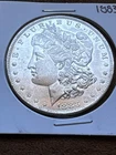 1883-o Morgan Silver Dollar.  Full Chest Feathers BU