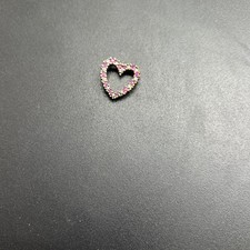 Sterling Silver Ruby Red Heart Shaped Pendant Featuring Elegant Round Cut Gems