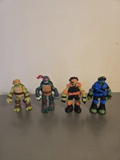 2012 - 2013 Viacom TMNT Teenage Mutant Ninja Turtles Set Of 4 Action Figures 