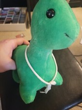 VINTAGE EDEN Toys PLUSH GREEN Soft DINOSAUR WITH STRING Baby With TAG