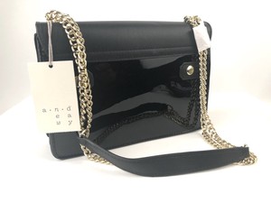 black leather handbag with chain strap