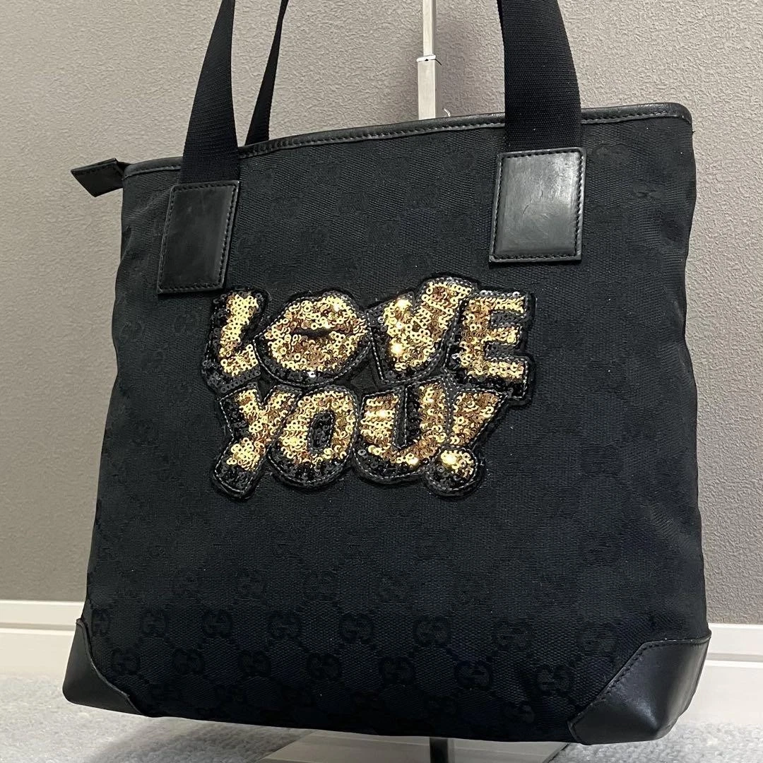 Sac à main fourre tout Gucci paillettes GG toile noir bandoulière