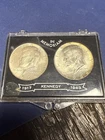 Set of Two 1964 Kennedy Half Dollars In Memoriam Coin Holder