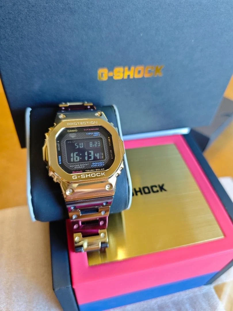 CASIO G-SHOCK GMW-B5000TR-9JR TranTixxii Titanio Multicolor Completo Metal con Caja
