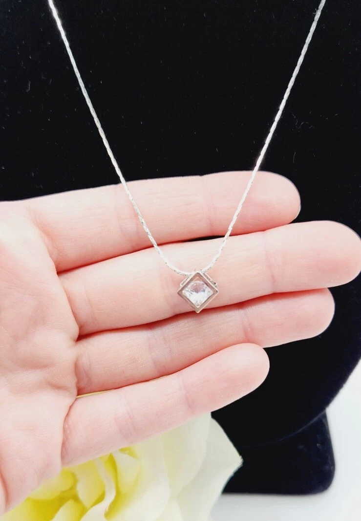 Cube necklace with diamond inside sale
