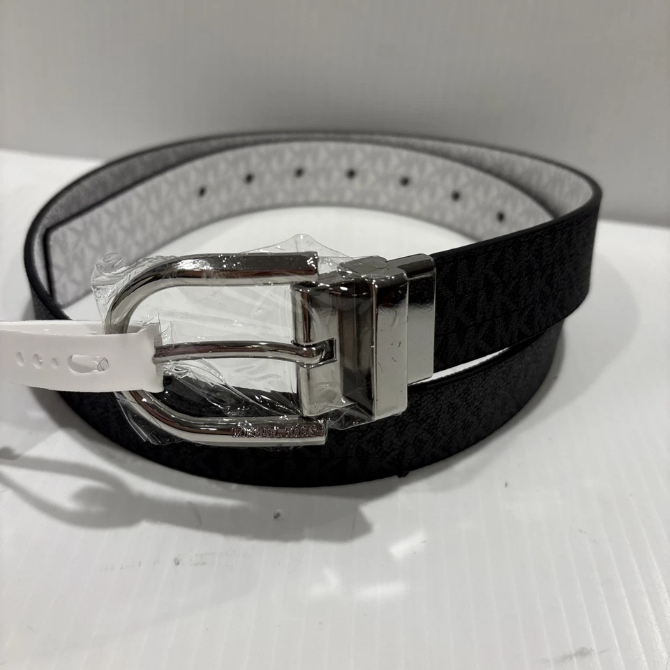 CINTURÓN DE CUERO REVERSIBLE MICHAEL KORS LOGOTIPO MK NEGRO/BLANCO CON HEBILLA PLATEADA Talla M Foto 4 de 4