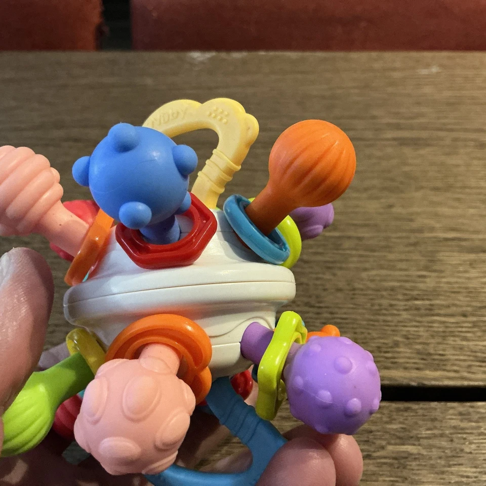 Nuby Textured Twist Ball Baby Teether Toy with Colorful Rattle - Image 4 of 4