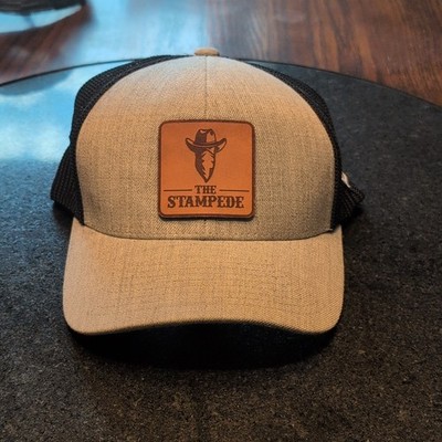 The Stampede Flex Fit Baseball Cap, Has Breathable Netting And Barley Worn