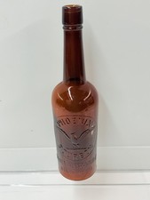 ANTIQUE PHOENIX BOURBON AMBER EMB GLASS BOTTLE (SAN FRANCISCO)