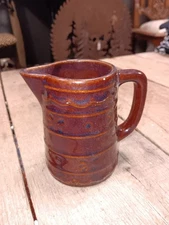 Brown Stoneware Creamer Pitcher With Slip-Trail Motif