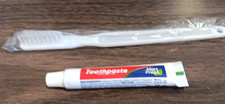 100 UNIT 0.35 oz ORALCARE 50-TOOTHPASTE/50-TOOTHBRUSH COMBO PACK TRAVEL/CHARITY