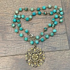 Turquoise Beaded Necklace with Floral Pendant