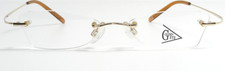 Vintage Golden Eye 7123SS-4 Gold Rimless Metal Eyeglasses Glasses 51-17-140 NOS