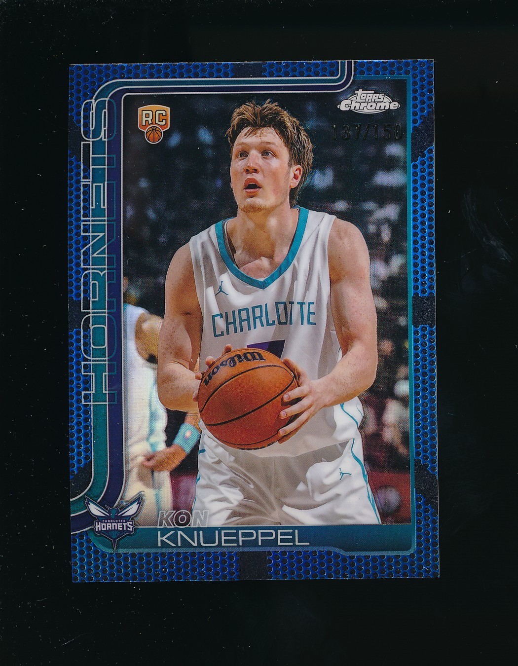 2025-26 Topps Chrome #254 Kon Knueppel Rookie Blue Refractor #137/150 Hornets