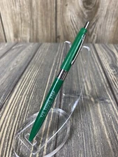 Vintage TJs Truck Stop Green Retractable Pen Advertisement