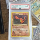 Pokémon TCG Charmander PSA 8 1st Edition Team Rocket 50/82