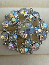15/16  Vintage aurora borealis rhinestone button in silver-tone metal.