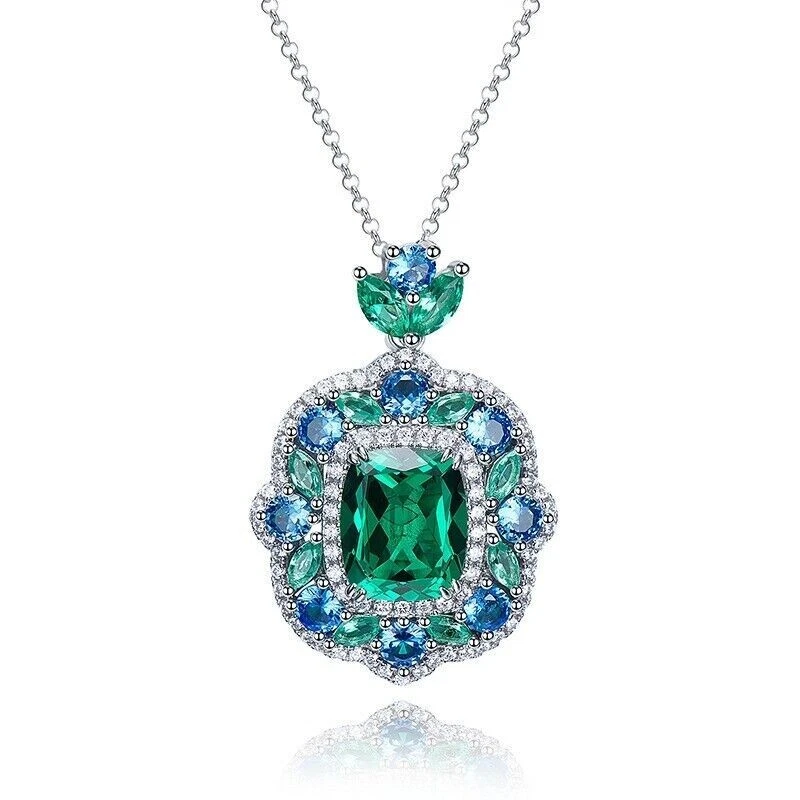 Collar colgante con halo de esmeralda y zafiro corte esmeralda de 4,80 quilates de oro blanco de 14 k Foto 3 de 4