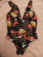 Multi flower plunge sun protect swim suit to fit size 20/48.chlorine resist.