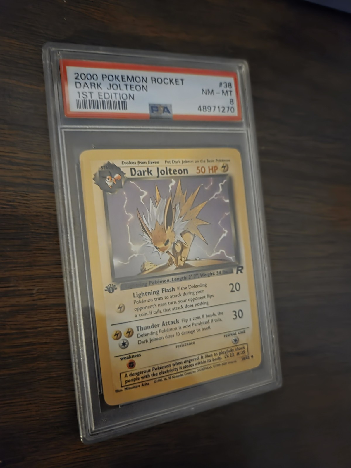 2000 POKEMON ROCKET 1ST EDITION #38 DARK JOLTEON PSA 8