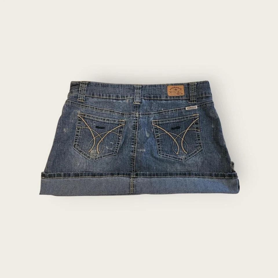 Minifalda vintage Y2k hidráulica lavado medio denim tiro bajo puños talla 9/10 Foto 2 de 4