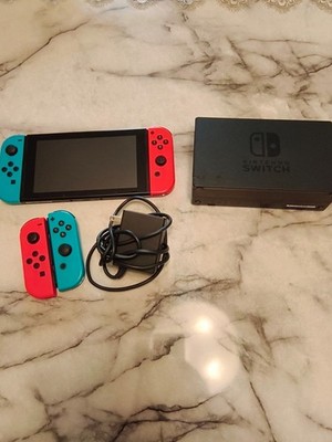 Nintendo Switch 32GB Handheld Console - Neon Red/Neon Blue used but still works