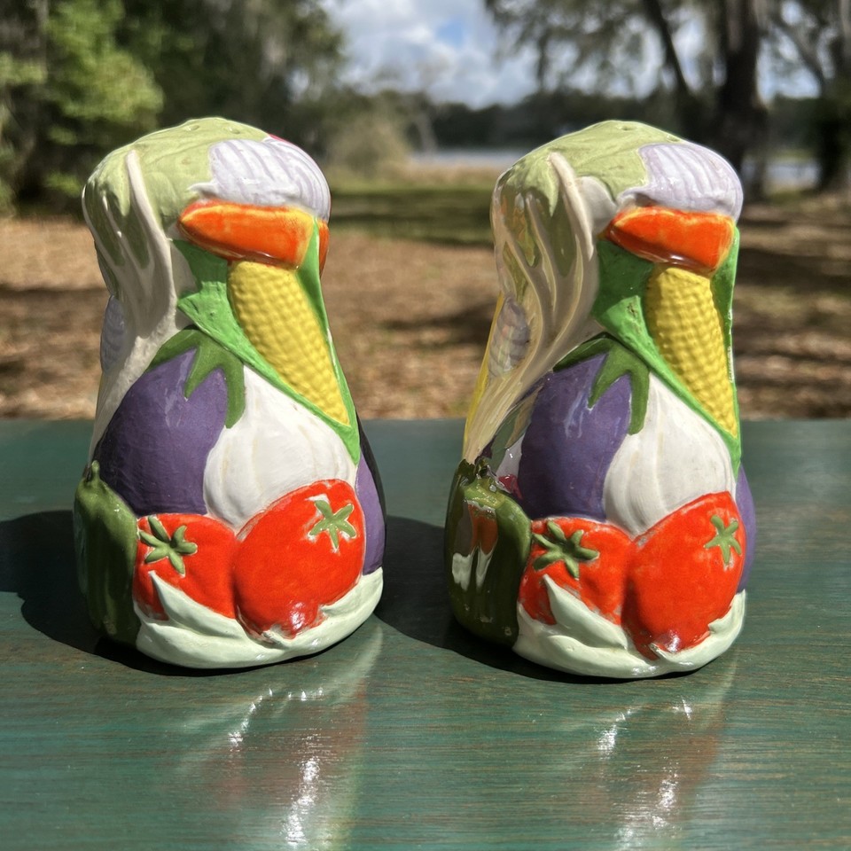 Chunky 1970s vegetable-shaped salt & pepper shakers with that peak-kitsch whimsy that looks intentionally cool on a retro kitchen shelf today.