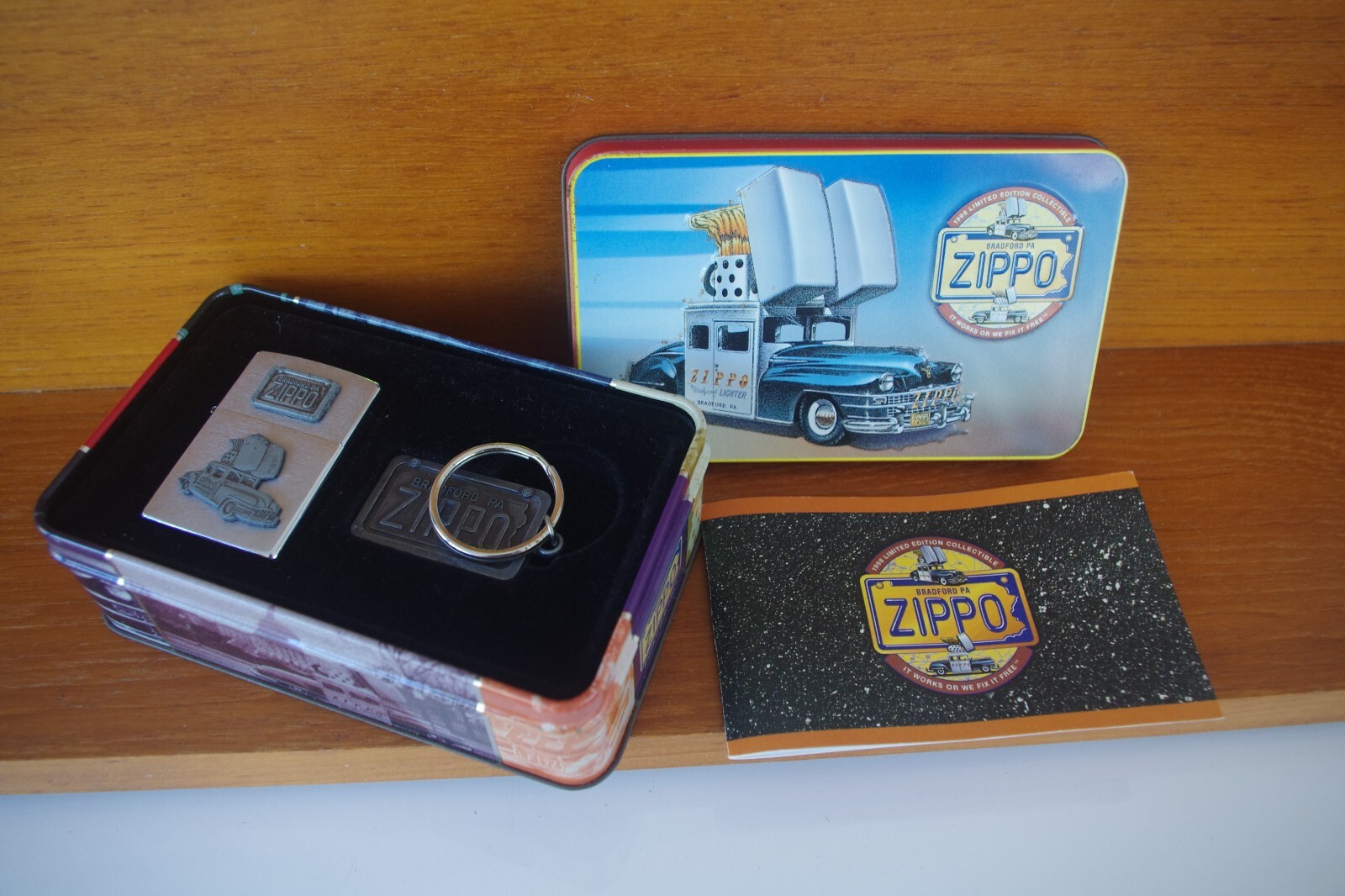 VINTAGE ZIPPO LIGHTER WITH KEYRING, BOOKLET, AND TIN CASE. eBay