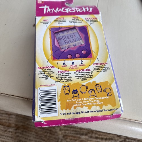 Vintage TAMAGOTCHI Purple/Pink In Original Box BANDAI 1997 Interactive - Picture 5 of 6