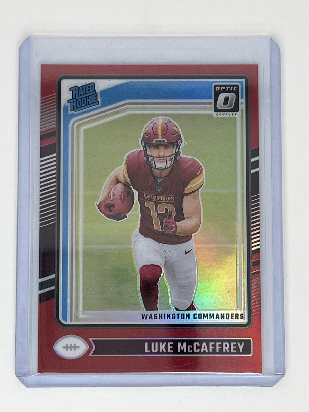 2024 Panini Football Donruss Optic Luke McCaffrey Red /125 #268 Rated Rookie