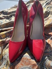 Step out in style with these elegant red women's heels. Perfect for any occasion