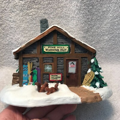 Pine Hill Warming Hut Figurine  Snowy Cabin with Squirrels & Winter Gear