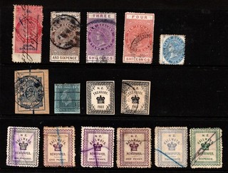 NEW ZEALAND A few used long type postal fiscals Railway stamps & cut outs