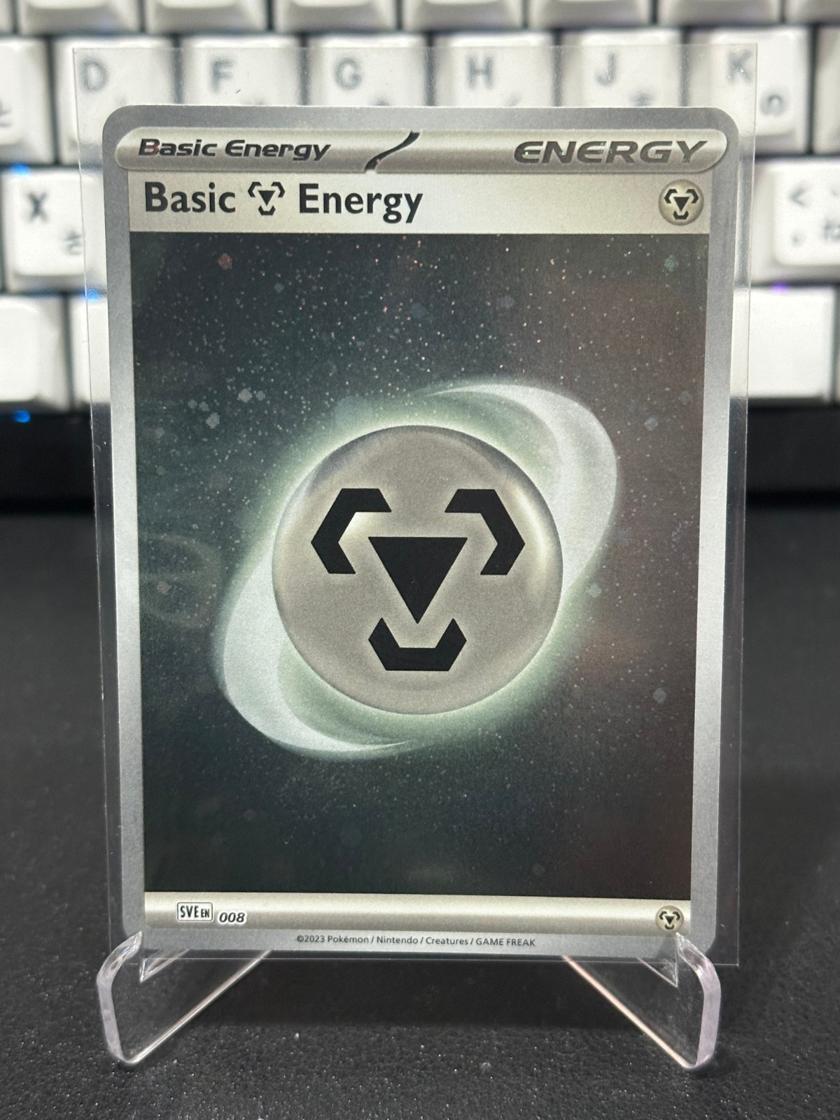 Pokémon TCG Metal Energy Prismatic Evolutions Sven 008 Holo