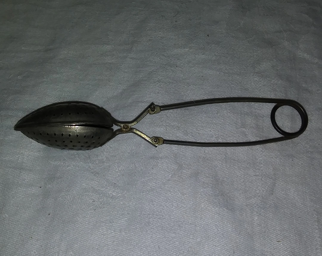 Antique tea strainer best sale spoon