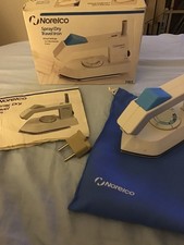 Fer à repasser de voyage avec cuiseur vapeur