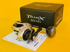 NEW SHIMANO TRANX 301 HG B LEFT HANDLE REEL TRX-301 HG B 7.6:1 *FAST DELIVERY*