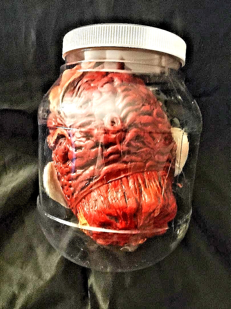 Spirit Halloween Shrunken Head in a Jar Decoration Prop