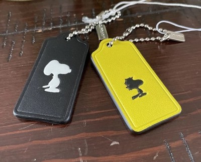 coach ウッドストック　キーホルダー COACH x PEANUTS Snoopy And Woodstock Leather Hangtag Keychain Fob