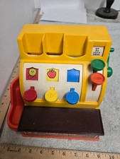 vintage fisher price cash register, 1974, with dog chewed coins