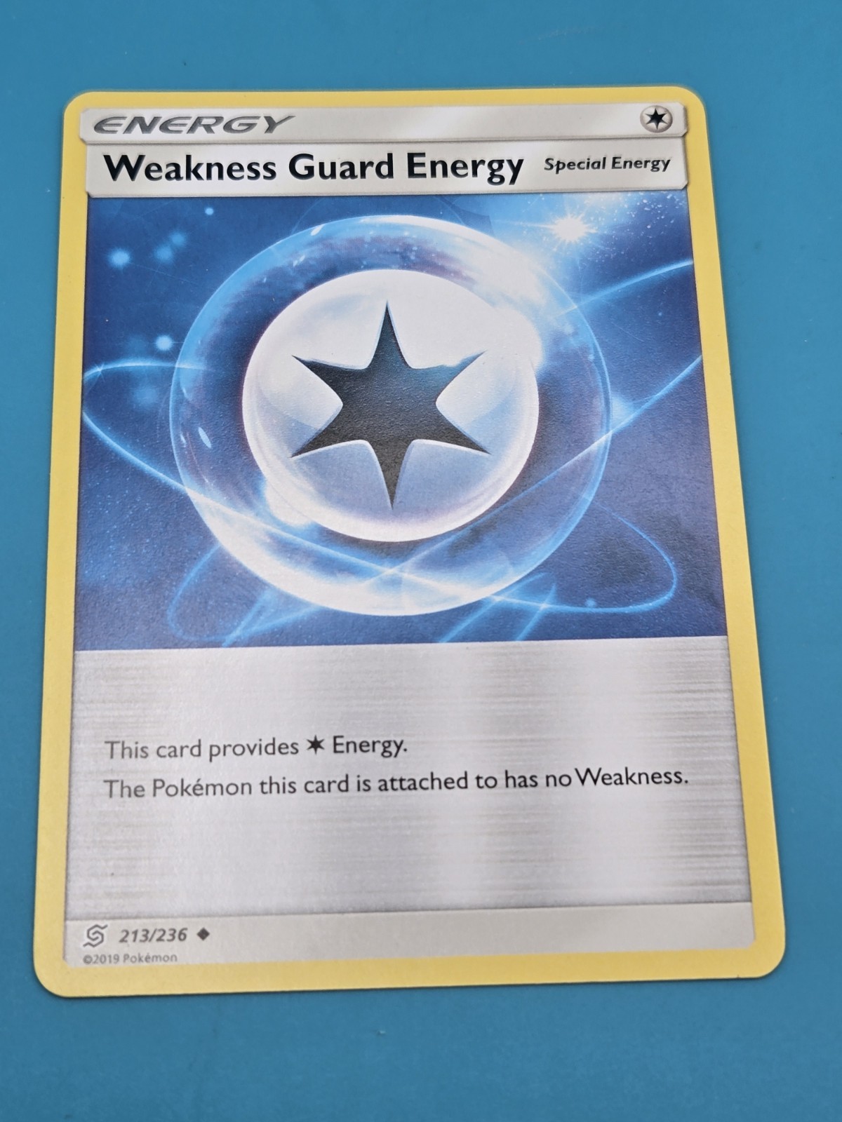Weakness Guard Energy - 213/236 - Unified Minds Pokemon Regular 2019 LP